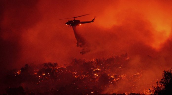Wildfire grows in California, thousands told to evacuate