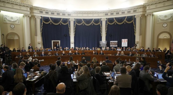 Impeachment charges head to House; Trump cries anew: ‘Hoax’