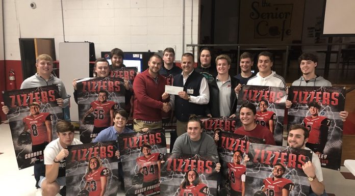 Football program donates Pink Out proceeds to OMC